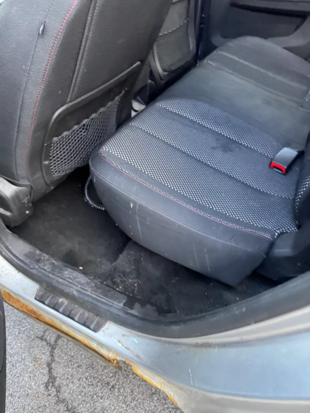 Rear car seat and floor during interior detailing by Buffalo Carpet NY